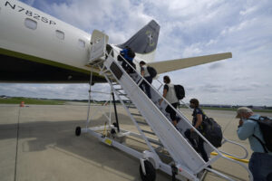 OUR DISASTER ASSISTANCE RESPONSE TEAM (DART) BOARDING THE FLIGHT THAT DEPARTED THIS MORNING FOR PORT AU PRINCE.
